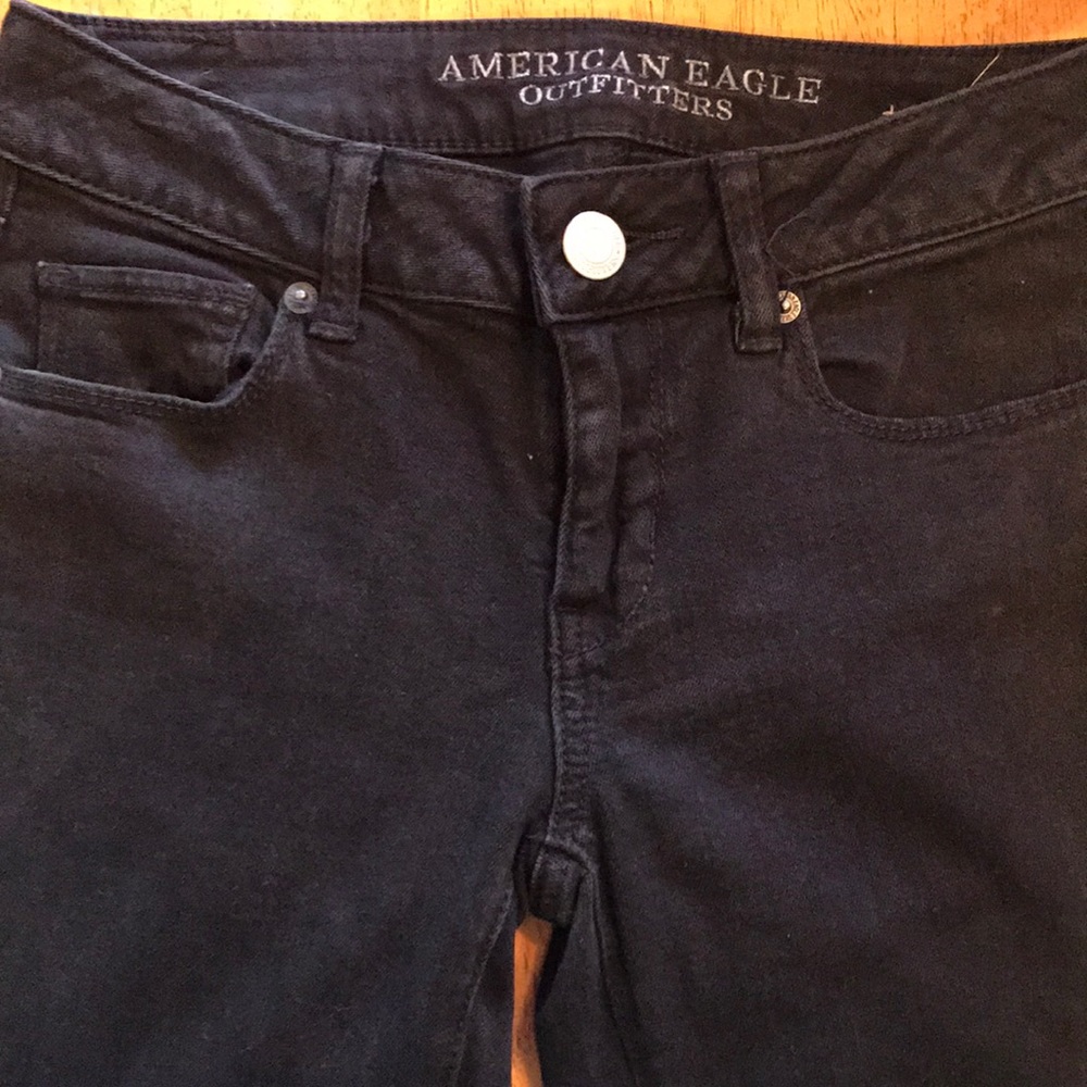 Black slightly distressed XLONG AE jeans